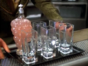 A tray of drinks...and Odo.